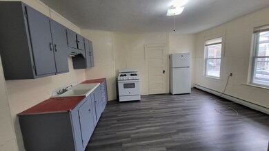 265 W 6th St unit 1st Rear, Lowell, MA 01850 - photo 2