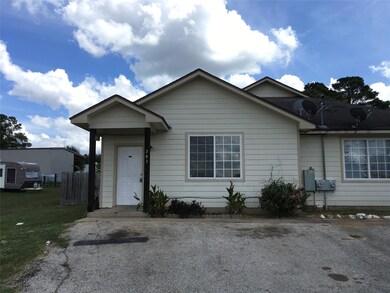 Ranch-style house featuring fence