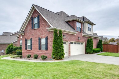 This home features a three-car garage and a fully fenced in back yard.