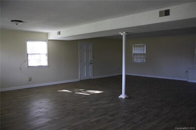 HUGE BASEMENT WITH NEW WOOD-LOOK TILE FLOORS