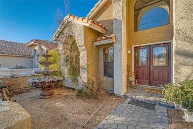 Entrance to property featuring a tile roof and stu