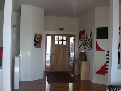 Foyer Entrance to Cherry wood floors