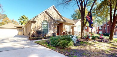 11702 Moccasin CT has a long driveway that could probably hold 4-5 more cars.