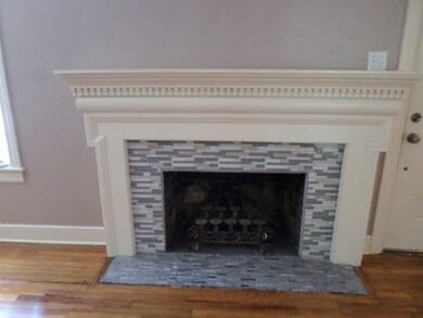 New Tile Around Fireplace