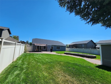 Back of house featuring a patio and a fenced backyard