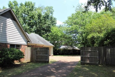 Gated to carport area