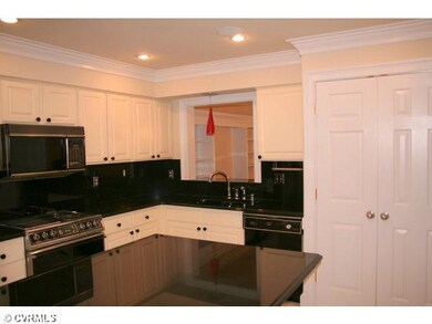 Kitchen - The contrast of the black counter tops a
