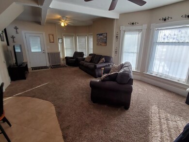 Front door entrance into living room