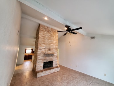 Soaring ceilings in den