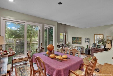 Dining area with light wood-type flooring