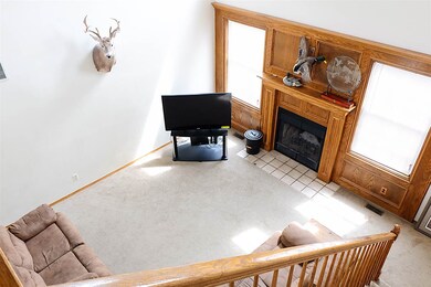 view from loft overlooking the living room