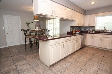 Kitchen with NEW Stainless steel appliances with s