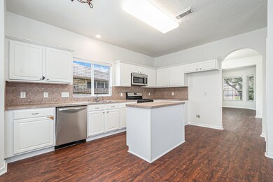 This kitchen features modern stainless steel appli