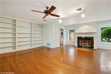 Family Room with Fireplace and built-in shelving