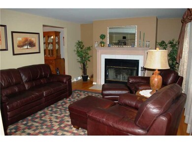 Living Room. Gleaming Hardwood Floors & Fireplace 