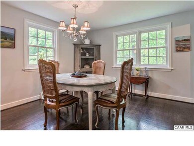 Dark hardwood floor, Thermal pane windows, plaster