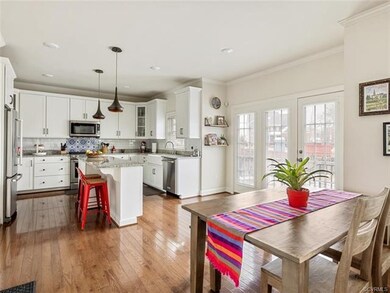 Open concept family room, dining and kitchen