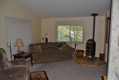 Living room open to dining room.