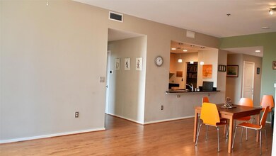 Dining space featuring sink and hardwood / wood-st