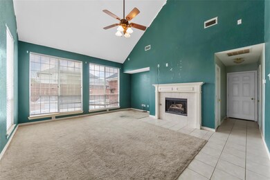 Unfurnished living room featuring ceiling fan, hig