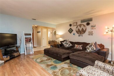 Spacious living room with newer laminate (Pergo) f