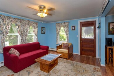 View of front entrance, living room...