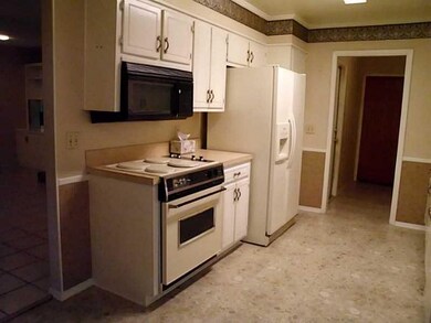 Kitchen View 2. galley is wide and roomy. enters f