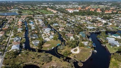 Aerial view with a water view and a residential vi