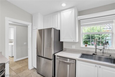 Kitchen featuring stainless steel appliances, wash