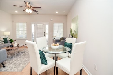 Dining area featuring visible vents, recessed ligh