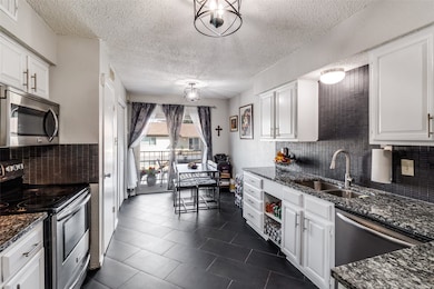 10650 Steppington Dr unit 206, Dallas, TX 75230 - photo 6