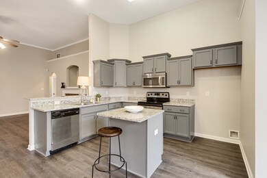 Lower cabinets include convenient flat pull out dr