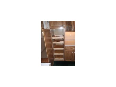 Kitchen. Premium cabinets and lots of them! Conven