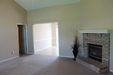 View from entry door in to Great Room and Dining Room  
