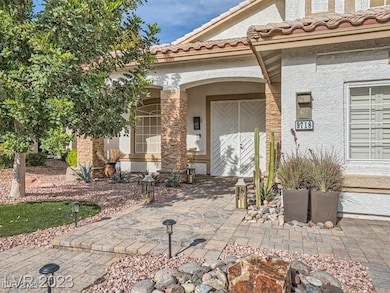 Entrance to property with stucco siding and a pati