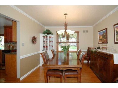 Dining Room. Rich wood flooring flows from the liv