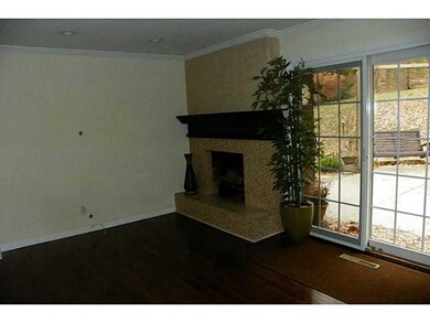 Exterior Front. Fireplace in kitchen