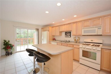 Kitchen with Kitchen island, all appliances stay a