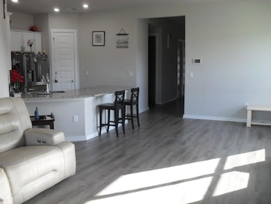 Living area featuring light wood-style floors and