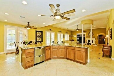 Open kitchen with large bar (seating for 6) and pl
