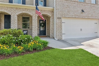 Front porch! Beautiful landscaping!