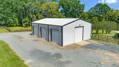 2400 sq. ft. steel frame, insulated shop with 5 ba