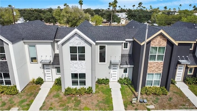 View of front of home with stone siding and stucco siding