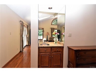 Wet bar is accessible from the dining and family r
