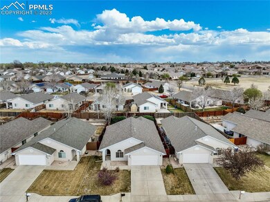 Aerial view of home and neighborhood