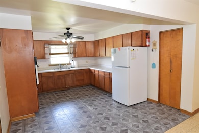 The kitchen has plenty of cabinets and ample counter space.  You even have room for an island if you wish to add one.  A pantry is available for extra storage.