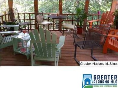 SCREENED IN DECK OFF OF KITCHEN