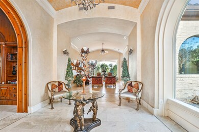 Entryway with library to the left