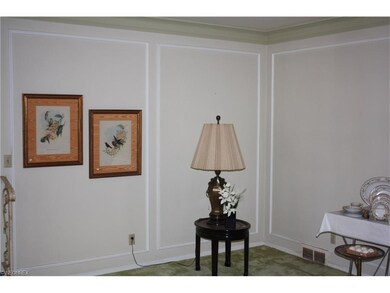 Step-down Living room can be accessed from Foyer and formal Dining room.