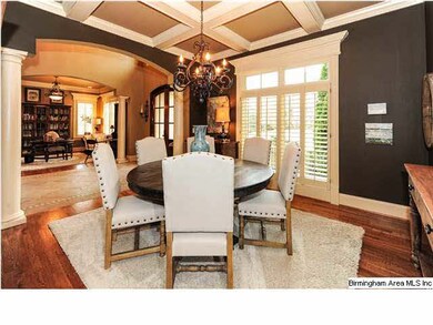 Beautiful Dining Room with coffered ceiling.